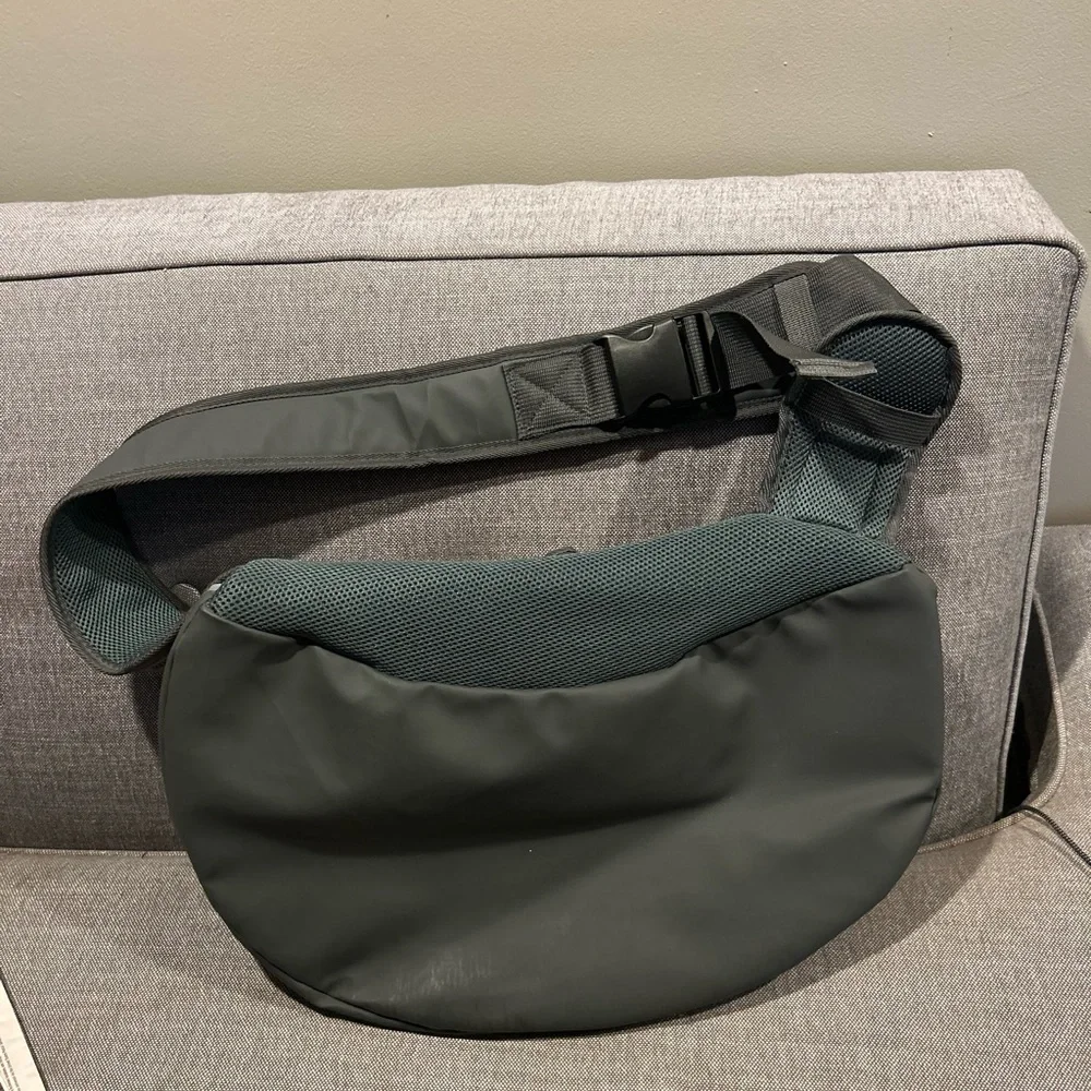 Brand new Pet Carrier. Grey/black. Holds up to 15 lbs.